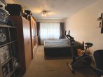 Vermietete 3-Zimmer-Wohnung mit Balkon und Garage in Wiesental - Schlafzimmer