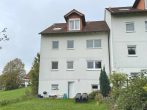 Vermietete 3-Zimmer-Dachgeschosswohnung mit Carport in Heidelsheim - Hausansicht - Rückseite